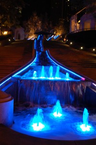 blue waterfall fountain on walkway